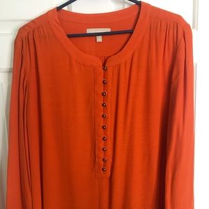 Orange tunic with brushed brass buttons
